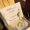 white booklet with box & single pen with name